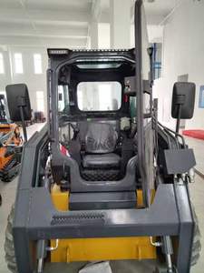 Dégivrage hivernal essentiel : Chargeur coulissant spécial avec cabine chauffée et équipement de nettoyage routier pour l'assainissement municipal - Product Image 5