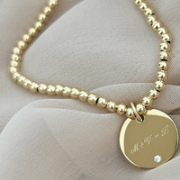 Bracelet perlé avec breloque disque en pierre CZ, en acier inoxydable plaqué or PVD, initiales gravées, symbole d'amour unique, cadeau bijou