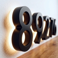 Enseignes d'adresse 3D flottantes en métal noir mat rétroéclairées personnalisées pour bâtiments, avec effet halo LED chaud, étanches IP65 pour entreprises