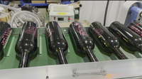 Machine automatique de sérigraphie de bouteilles de vin en plastique verre multicolore cylindrique