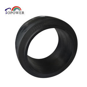 Neumático sólido Topower Press Fit 22x10x16 con banda de rodadura plana para remolque de plataforma plana - Product Image 1