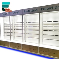Vitrine de magasin d'accessoires pour téléphones portables personnalisée avec porte en verre pour l'affichage des coques de téléphone