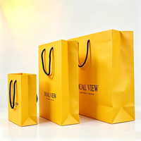 Sacs cadeaux en papier jaune de luxe pour bijoux, bracelets, boucles d'oreilles, colliers, bagues, emballages de grande capacité, personnalisables