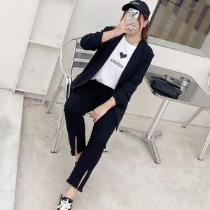 Pantalones Vaqueros Acampanados de Algodón para Mujer Tallas Grandes con Dobladillo Abierto N7502 Color Sólido Estilo Femenino Adulto - Product Image 1