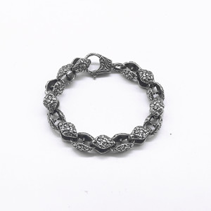 Bracelet unisexe en acier titane avec relief de crâne, design géométrique, style punk moto, bijoux - Product Image 1