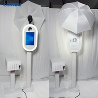 Équipement de photomaton, machine avec iPad, appareil photo reflex numérique, design ovale pour location d'événements de mariage