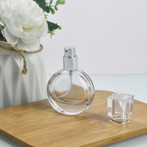 Botella de <span class=keywords><strong>Perfume</strong></span> Cuadrada de Vidrio Transparente de 25 ml al por Mayor con Caja, Recargable con Tapa y Logotipo Personalizado, Estilo Moderno de Lujo - Product Image 1
