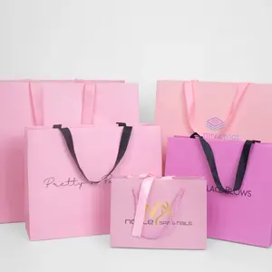 Logo kağıt torba ayakkabı butik pembe ambalaj hediye kağıt giysi ambalajı için kendi alışveriş çantası ile yeni kraft kağıt torbalar