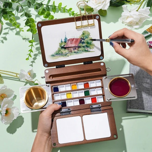 <span class=keywords><strong>Palette</strong></span> d'aquarelle de voyage XinyiArt, 24 compartiments, pliable, portable, <span class=keywords><strong>en</strong></span> <span class=keywords><strong>bois</strong></span> de noyer, avec pinceau, clip et gobelet pour le <span class=keywords><strong>dessin</strong></span> - Product Image 1