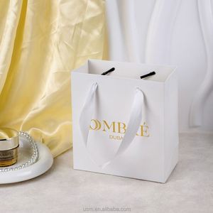 Sac en papier kraft de luxe imprimé personnalisé tendance 2025, sac cadeau en papier avec poignée en ruban pour sac de shopping - Product Image 2