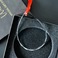 Großhandel Blanko K9 Kristallglas Weihnachtsornamente in Verschiedenen Formen, Individuell Anpassbar mit Rotem Band als Weihnachtsbaum-Dekoration
