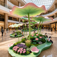 Installation de sculpture d'ombrage extérieur en résine de fibre de verre, au design feuille de lotus verte, pour parcs paysagers et places commerciales