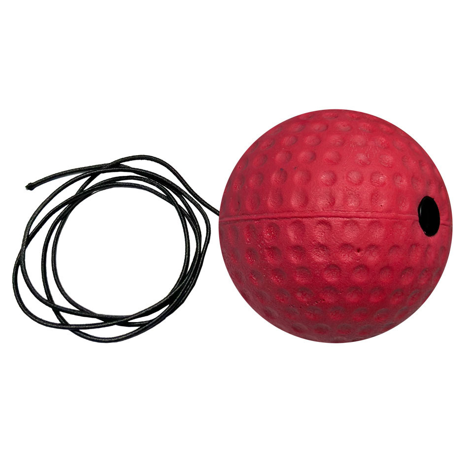 Pelota dura de goma roja.