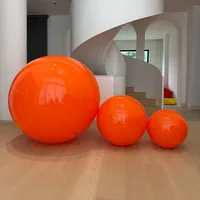 Esfera Inflable Naranja Mate Vibrante, Esfera Gigante de PVC para Instalaciones de Arte Moderno y Exhibiciones Comerciales Creativas en Escaparates