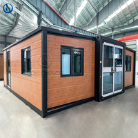 Maison conteneur mobile à double aile extensible avec design moderne, étanche et installation rapide, solution préfabriquée polyvalente