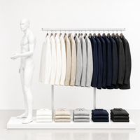 Présentoir de vêtements autoportant blanc à deux poteaux avec base de mannequin pour aménagement de boutique