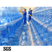Bouteille d'eau potable en matériau PC recyclable de 5 gallons (18,9 L) 20 litres avec poignée