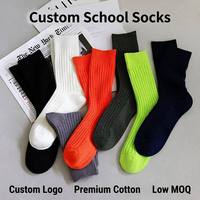 Chaussettes d'uniforme en coton premium personnalisées à côtes verticales, couleur unie, mi-mollet, tricotées pour étudiants et sportifs, OEM ODM