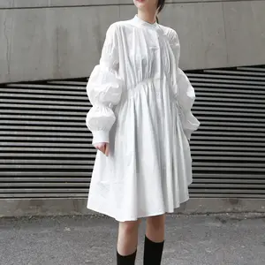 新しい春秋ファッションルーズフィットミディ丈プリーツステッチ非対称カジュアルシャツドレス