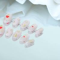 Uñas artificiales, uñas hechas a mano de alta gama, forma de uña ovalada pequeña, estilo de Luna pequeña en forma de corazón, reutilizables, venta al por mayor de fábrica.