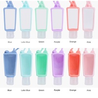 Housse de protection colorée en silicone pour flacon de désinfectant pour les mains, portable, pour voyage, avec porte-clés, pour mini-contenant