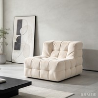 Fauteuil moderne en tissu capitonné avec design modulaire rembourré en peluche pour salon de luxe et coin détente à domicile