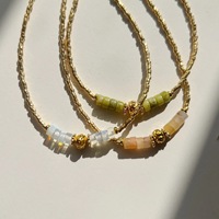 Collier d'usure quotidienne transfrontalière Niche série Yusen trèfle à quatre feuilles Design chaîne mince dorée pierre naturelle laiton