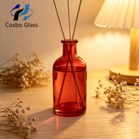 Bouteille en verre cylindrique rouge en gros 50ml 100ml pour diffuseur à bâtonnets vide