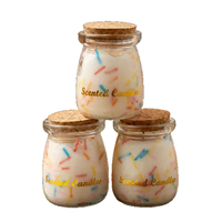 Bougie parfumée artisanale dans un joli récipient en verre style bonbon, pour souvenir de fête ou décoration d'intérieur