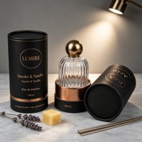 Emballage de parfum de luxe personnalisé en tube de papier avec logo en feuille d'or et matériau recyclable pour flacons de 30 ml, 50 ml et 100 ml