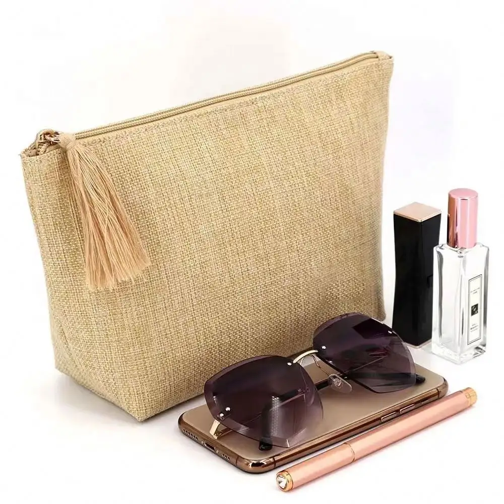 Bolsa de cosméticos con cremallera de lino de paja natural personalizada de fábrica con borla de rafia tejido maquillaje belleza señoras bolsa de regalo
