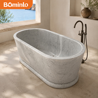 Baignoire ovale autoportante en marbre blanc veiné gris, monobloc massif avec socle, pour hôtel, villa, salle de bain