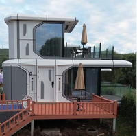 Système de maison capsule spatiale à double étage de luxe, hôtel mobile de plage et maison d'hôtes, conteneurs pour supermarché et immeuble de bureaux