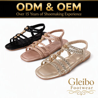 Sandales plates tressées pour femmes, style gladiateur, avec lanières élastiques à la cheville et motif floral, décontractées, pour la marche, vente en gros, directement de l'usine, OEM ODM