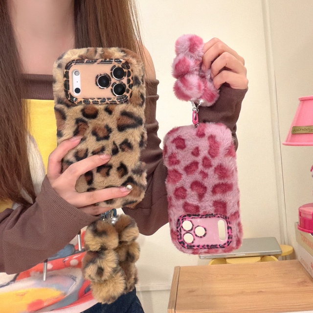 Leopard Plush Fur Phone Case for iPhone 17 Pro Max with Camera Lens Stand and Furry Pom Pom Soft Warm Winter Cover for Girls