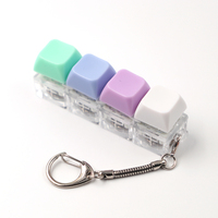 Plastic Keyboard Fidget Keychain 4-in-1 with Light UV Printing Cartoon Design and Logo