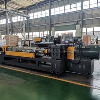 Machine de revêtement adhésif en caoutchouc butyle entièrement automatique avec extrudeuse pour membranes EPDM et ruban en aluminium