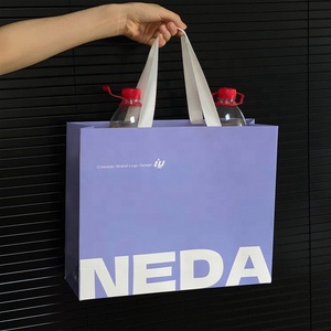 Lüks renkli kağıt alışveriş torbaları toptan ucuz hediye Premium kağıt taşıma çantası ile özel Logo baskı giyim ambalaj için - Product Image 2