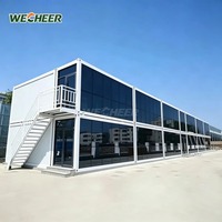 Bâtiments modulaires préfabriqués légers et économiques, maisons conteneurs en kit résistantes au vent pour projets de construction à l'étranger