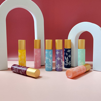 Bouteille de parfum en verre rouleau coloré en gros emballage de logo personnalisé CN;GUA rouleau sur bouteille de verre sérigraphie cosmétique 10ml