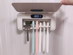Stérilisateur de brosses à dents UV avec horloge numérique et support pour rasoir, boîte de stérilisation murale en plastique pour salle de bain - Product Image 1