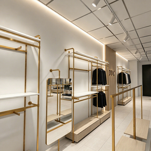 Aménagement intérieur de boutique de vêtements pour hommes au design moderne et haut de gamme, présentoirs à vêtements autoportants dorés sur mesure pour magasin de détail - Product Image 1
