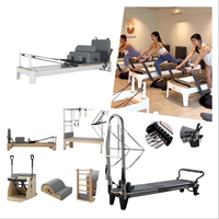 Reformer de Pilates en aluminium blanc, modèle Studio Infinity Bar, avec structure coulissante en aluminium blanc