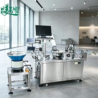 Machine de marquage laser double fibre et UV avec alimentateur rotatif intelligent et alimentation anti-blocage pour le traitement en série des bouchons de flacons