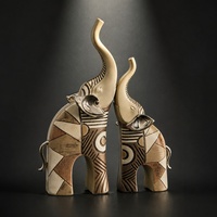 Figurines modernes en résine beige représentant une mère éléphant et un jeune éléphant, avec motif géométrique, pour la décoration de salon, de bureau ou de table.