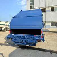 Camion Compacteur à Ordures Bleu Personnalisé HOWO 4X2 RHD avec Transmission Manuelle, Pompe et Moteur, Capacité 14 m³ 10-15 Tonnes