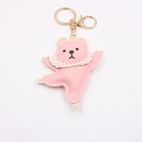 Porte-clés en cuir mignon et amusant en forme d'ours en peluche dansant avec écharpe et impression UV