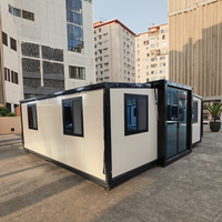 Maison préfabriquée en acier moderne de luxe, 20 pieds/40 pieds, isolée, respirante, conteneur portable, extensible, boutique prête à l'emploi, installation rapide
