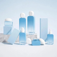 Flacons de crème pour le visage en verre avec logo personnalisé de luxe, ensembles d'emballages de sérum pour soins de la peau, emballés dans un carton