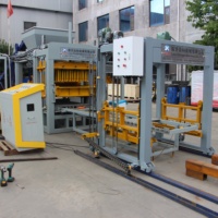 Machine à briques en ciment hydraulique QT4-15 pour la fabrication de pavés
